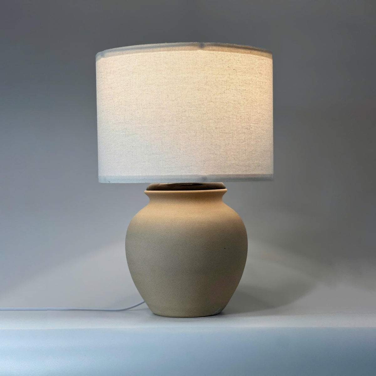 Handmade Cream Ceramic Table Lamp – Bat Trang Pottery Vietnam, minimalist design that fits most interiors and adds warm, timeless decor.