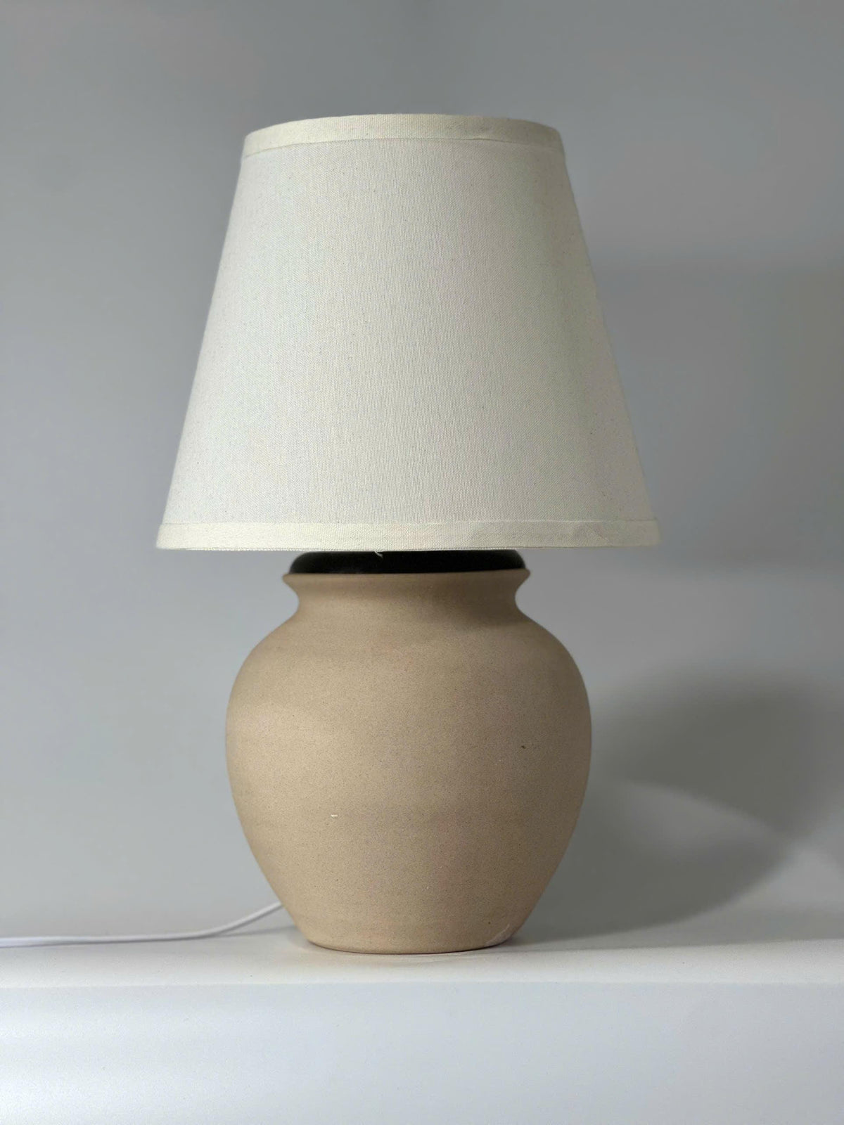 Handmade Cream Ceramic Table Lamp – Bat Trang Pottery Vietnam, minimalist design that fits most interiors and adds warm, timeless decor.