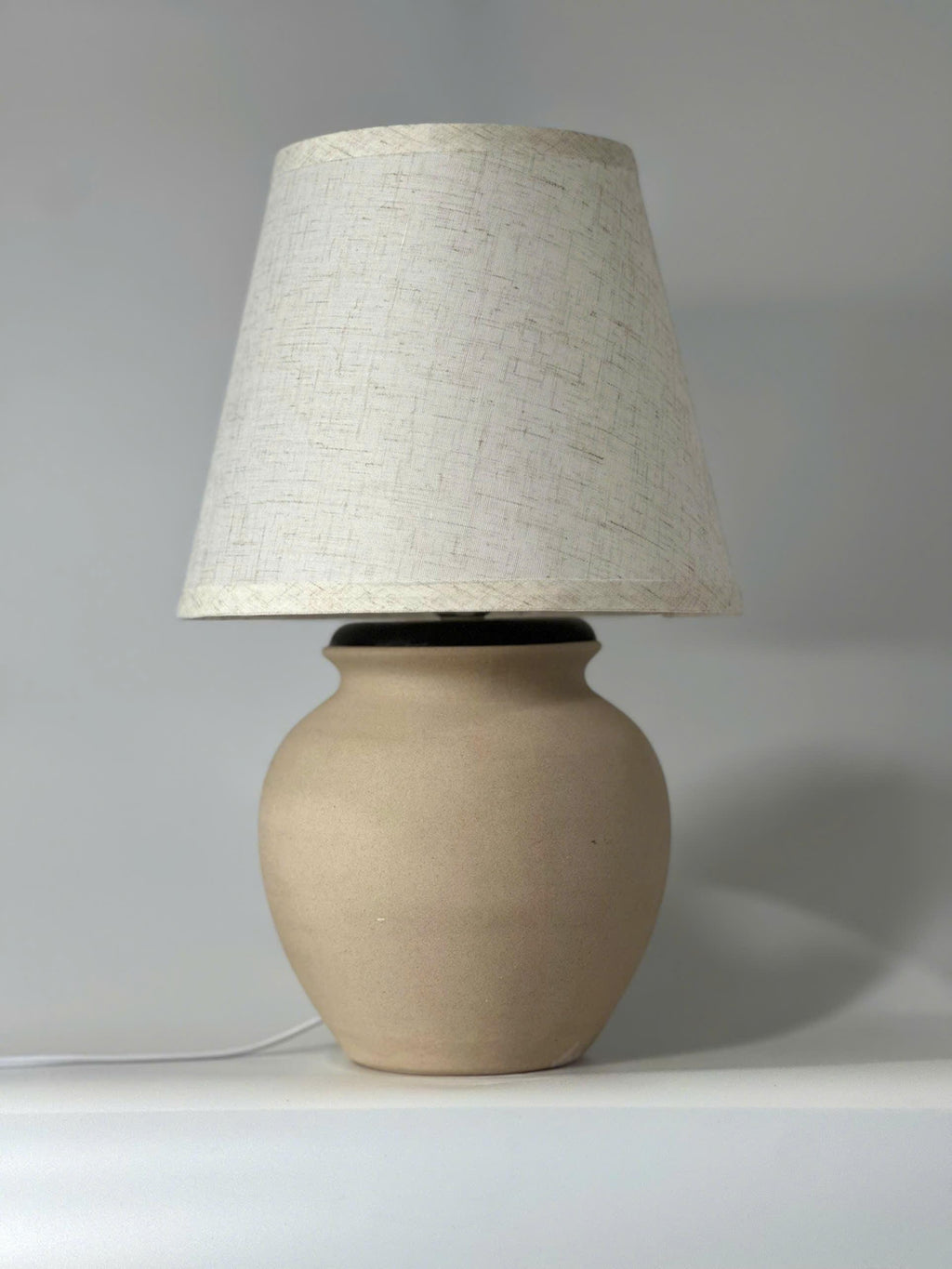 Handmade Cream Ceramic Table Lamp – Bat Trang Pottery Vietnam, minimalist design that fits most interiors and adds warm, timeless decor.