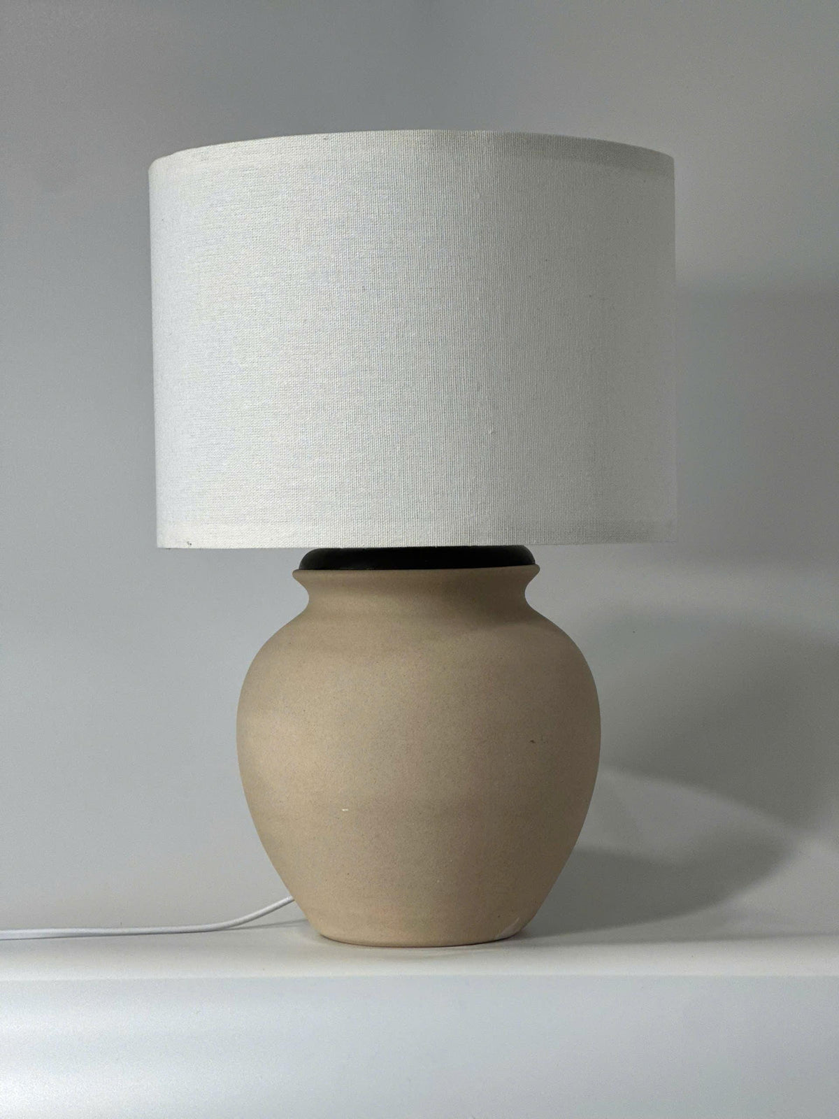 Handmade Cream Ceramic Table Lamp – Bat Trang Pottery Vietnam, minimalist design that fits most interiors and adds warm, timeless decor.