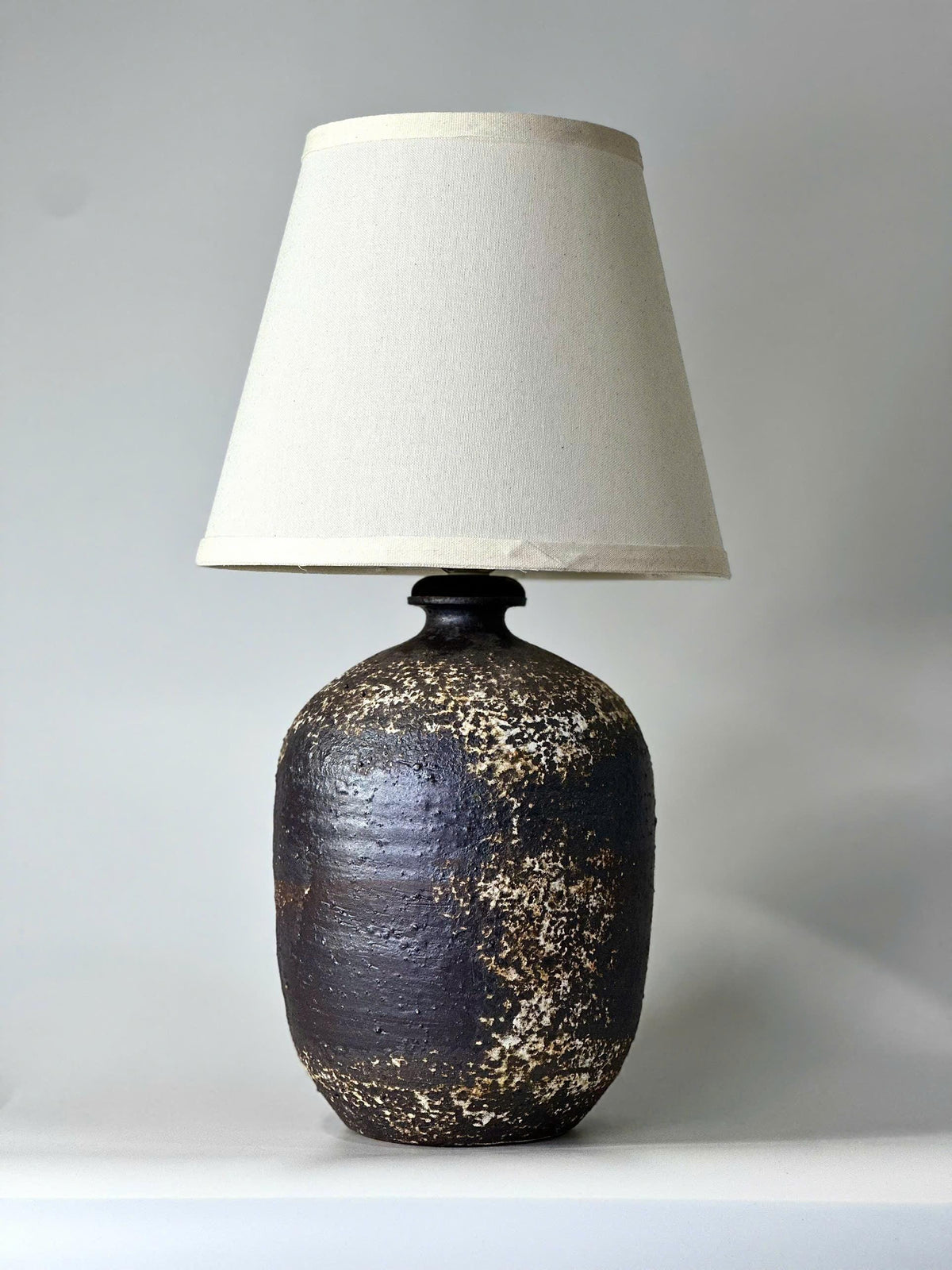 Handcrafted Ceramic Lamp, Ancient Cylindrical Form, Textured Glaze, Linen Shade, Wabi-Sabi Glow