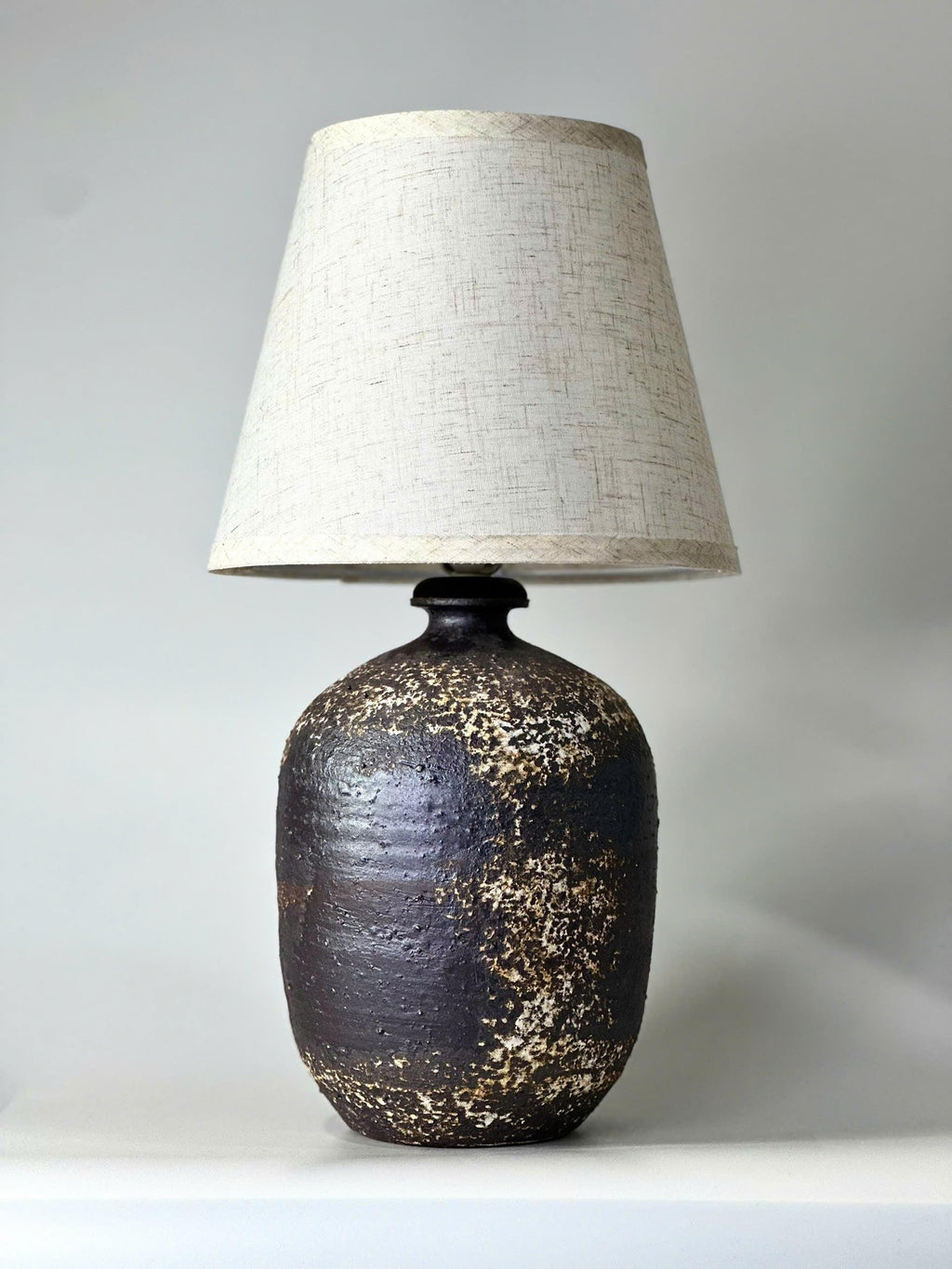 Handcrafted Ceramic Lamp, Ancient Cylindrical Form, Textured Glaze, Linen Shade, Wabi-Sabi Glow
