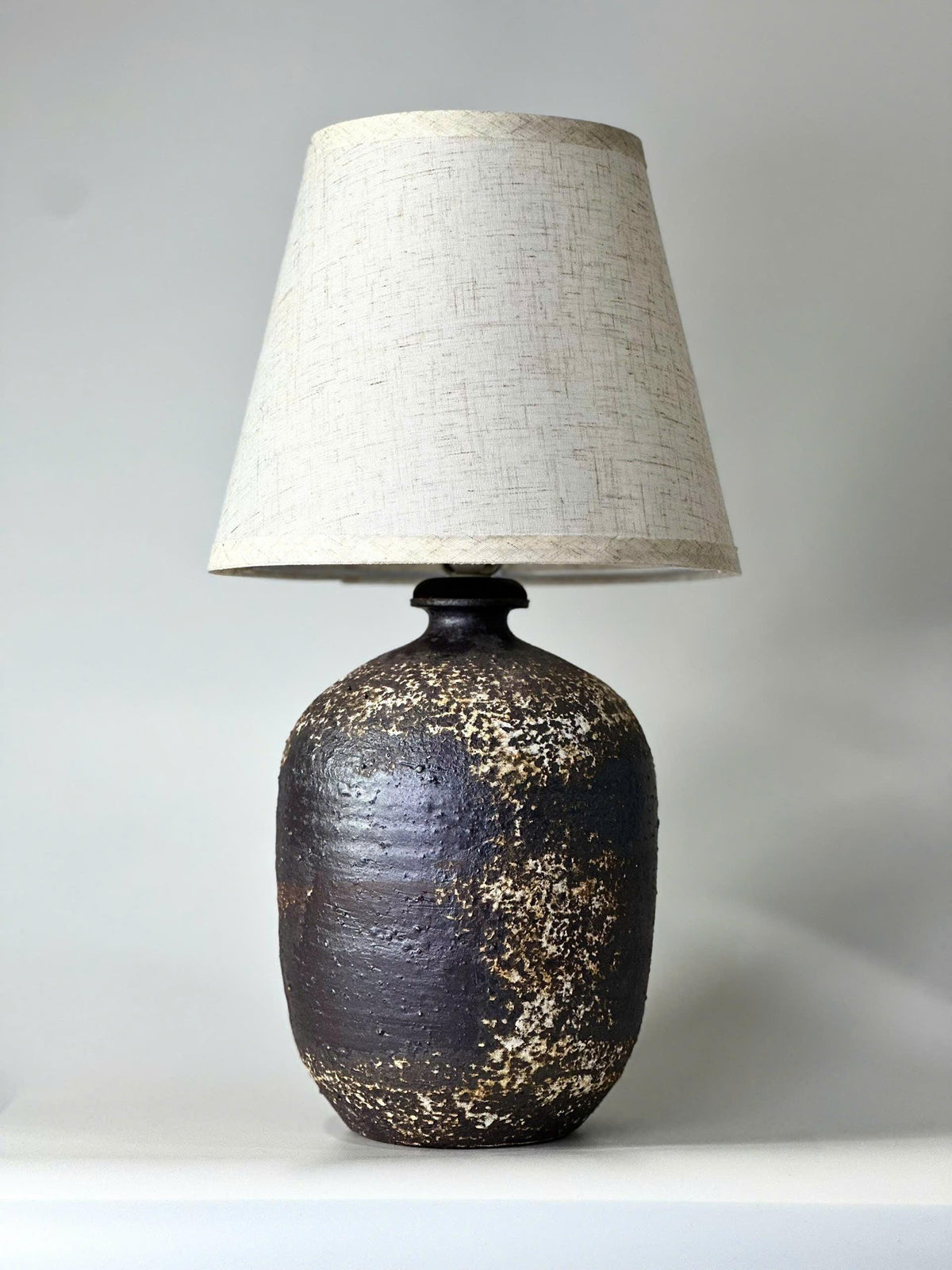 Handcrafted Ceramic Lamp, Ancient Cylindrical Form, Textured Glaze, Linen Shade, Wabi-Sabi Glow
