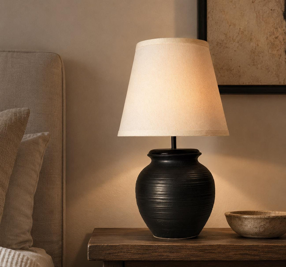 Handmade ceramic table lamp with warm ambient light. Simple form, gentle glow, timeless mood. Bat Trang ceramic, Vietnam.