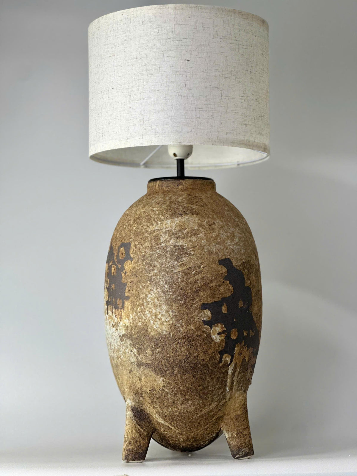 Elevate your home with this handmade ceramic lamp, featuring organic textures, warm tones, and a timeless artisan finish.