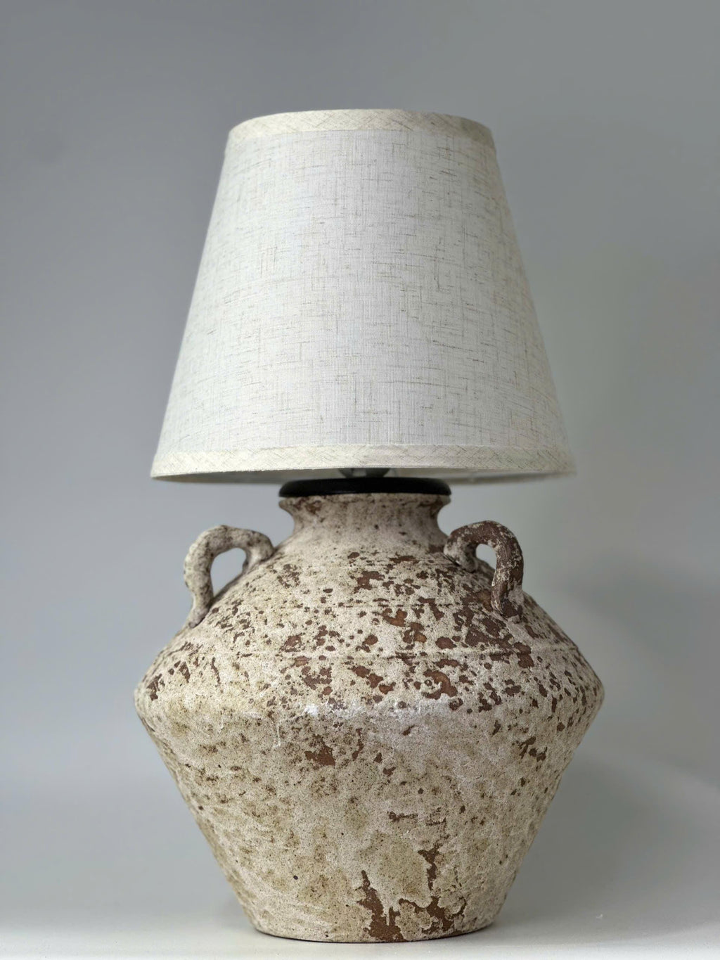Unique ceramic craftsmanship that turns a simple lamp into a timeless statement piece.