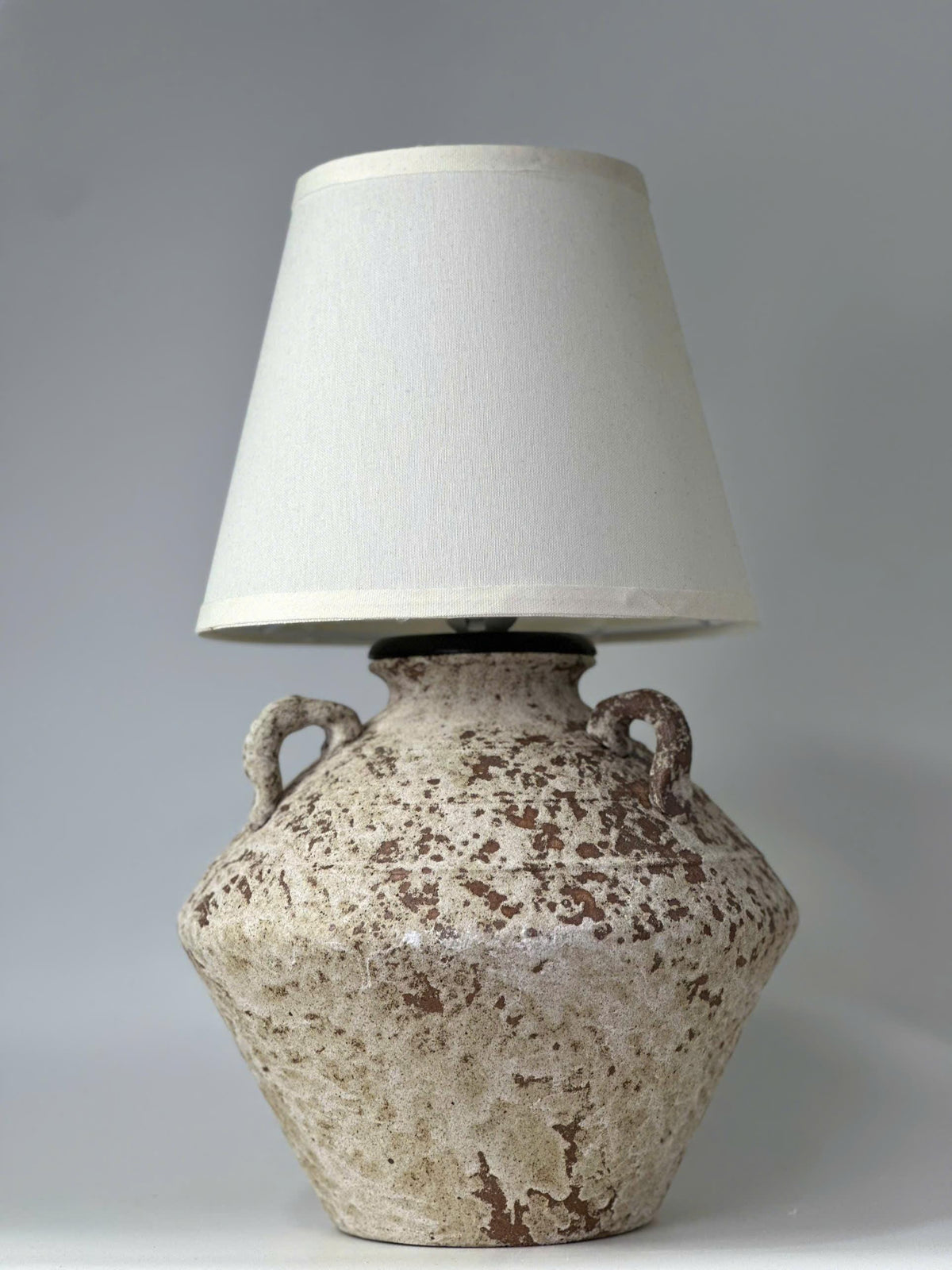 Unique ceramic craftsmanship that turns a simple lamp into a timeless statement piece.