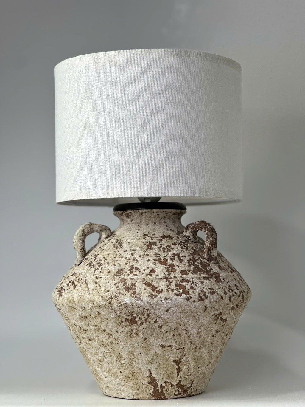Unique ceramic craftsmanship that turns a simple lamp into a timeless statement piece.