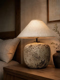 Handcrafted ceramic lamp with an antique-inspired finish. Timeless texture, soft glow, endless warmth
