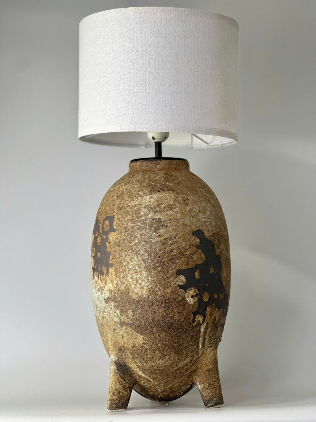 Elevate your home with this handmade ceramic lamp, featuring organic textures, warm tones, and a timeless artisan finish.