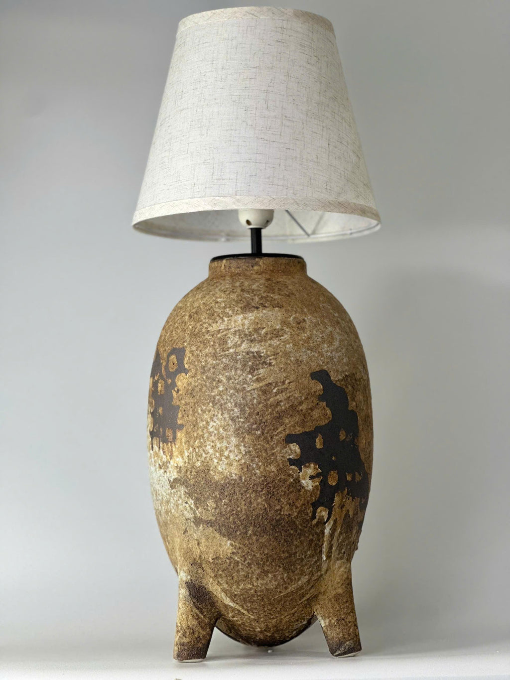 Elevate your home with this handmade ceramic lamp, featuring organic textures, warm tones, and a timeless artisan finish.